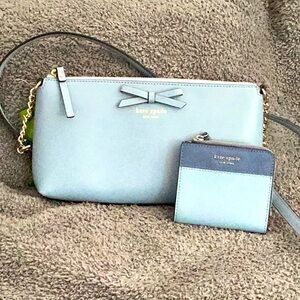 Brand new with tags Kate Spade purse with matching wallet.